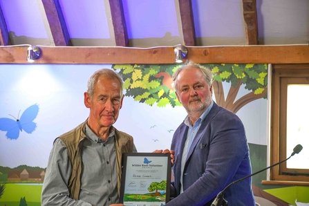 Peter smart receiving wilder kent volunteer award