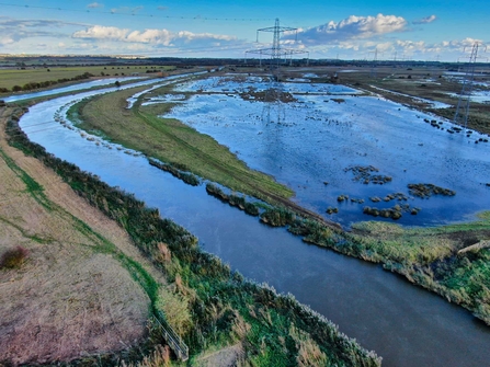 The Minster Marshes with pylons built in the water.