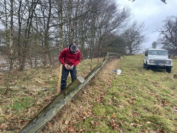 Our reserve team repair a damaged fence at Chilston
