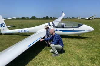 Lawrence KWT and Adrian Gliding club counting insect splats on glider wing for bugs matter