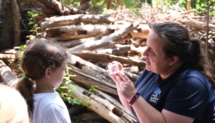 Anna showing child minibeast