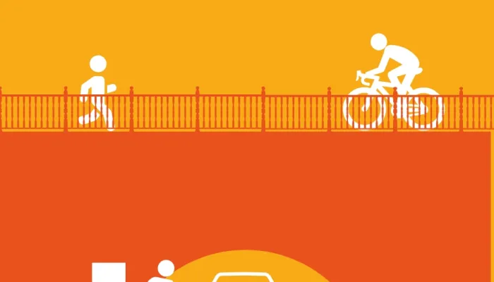 a runner and cyclist on a bridge over looking someone charging an electric car