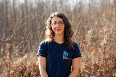Heidi Aguirregoicoa stood in front of the woods. One of the bison rangers for Kent Wildlife Trust/ 