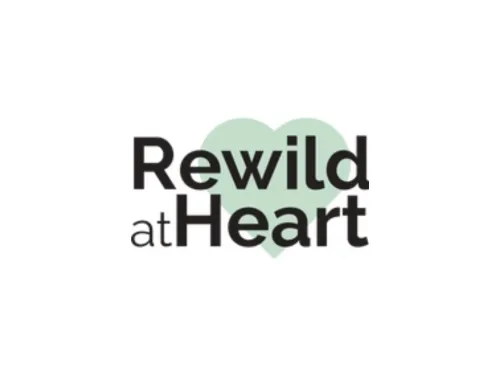 The logo for Rewild at Heart.