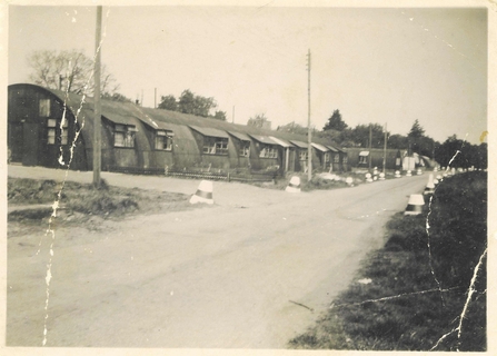 Old photo showing Cade Road on Hothfield Heathlands in 1950s of an Army canteen building