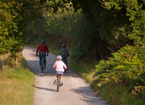 Family cycling outdoors, photo by Ross Hoddinott/2020VISION